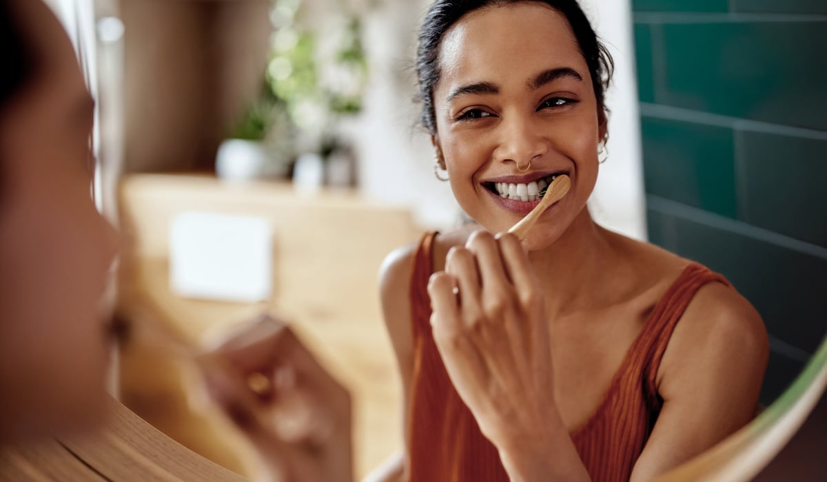 Woman brushing teeth